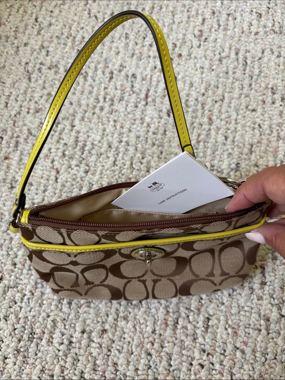 Coach Brown Signature Canvas Wristlet with Yellow Trim
